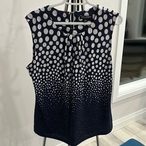 Pokadot, sleeveless blouse